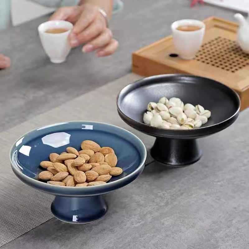 Đĩa trà gốm sứ kiểu Trung Quốc Đĩa trái cây chân cao đồ ăn nhẹ sáng tạo trái cây trà đạo gia dụng phòng khách đĩa trái cây khô Đĩa trái cây