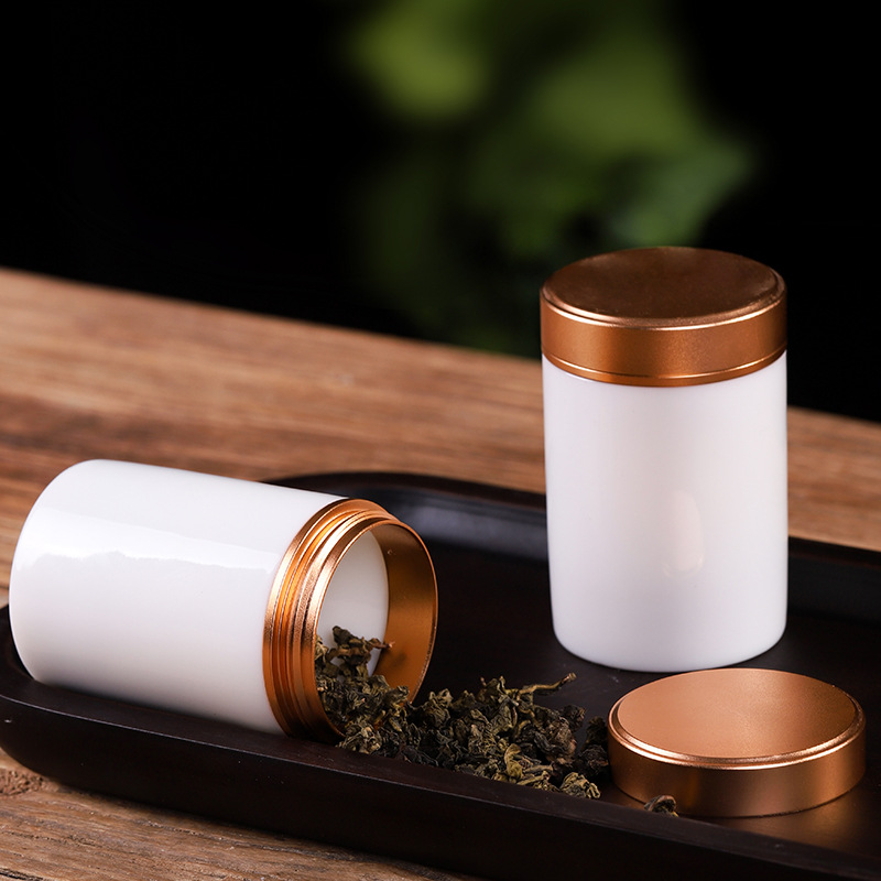 Mỡ cừu trắng tinh khiết Ngọc sứ trà lon thiếc gốm sứ niêm phong lọ tiết kiệm quà tặng bán buôn hộp trà cầm tay