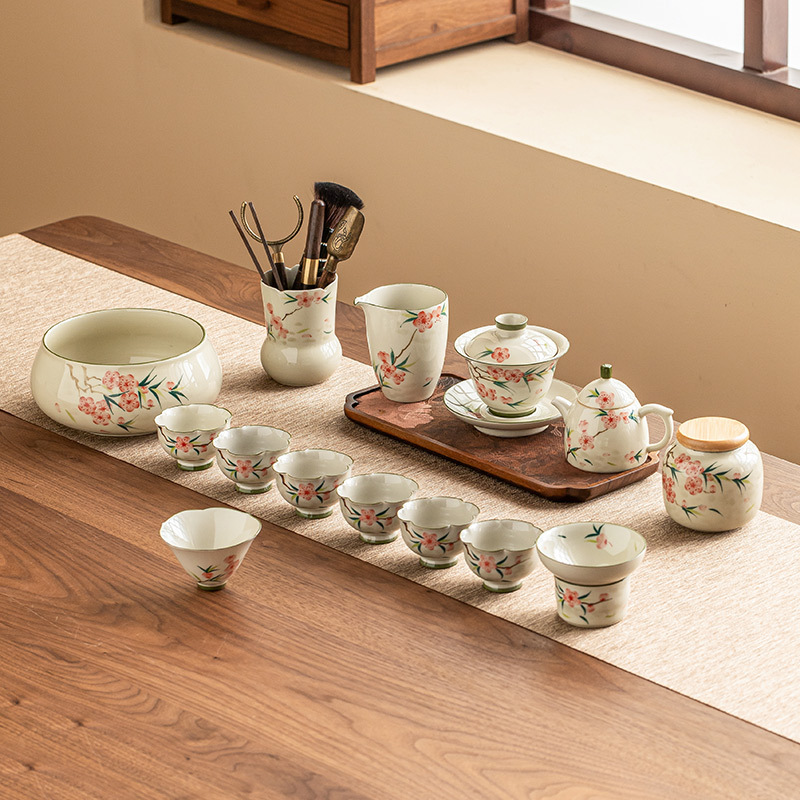Bộ ấm chén trà hoa đào vẽ tay mẫu mới 2025 dùng cho nhà và văn phòng, chất liệu gốm sứ