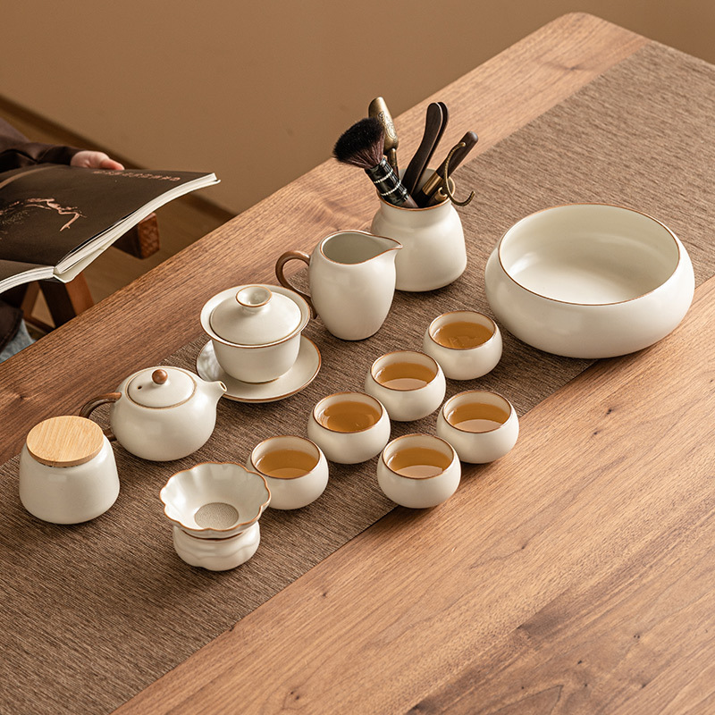 Bộ ấm chén trà Ru Kiln màu be 2025 mới, kiểu dáng đơn giản, dùng trong gia đình, gồm ấm trà Kung Fu có nắp, chén, chén trà và hộp đựng trà.