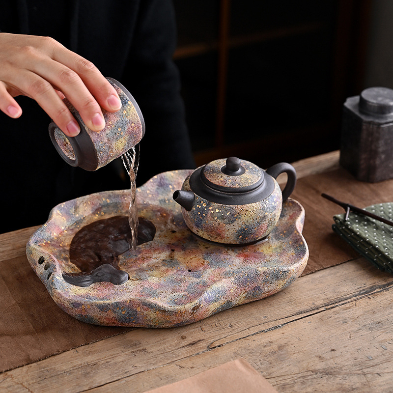 Ấm vàng điểm mỏ đá đầy màu sắc thủ công, bàn trà pha khô trữ nước gốm thô kiểu Nhật, bộ trà gia dụng, giá đỡ ấm trà