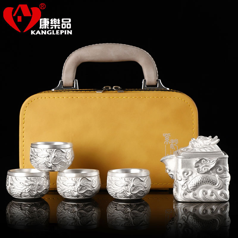 Bộ ấm trà bốn tách màu tím cát rồng bốn biển mạ bạc 999