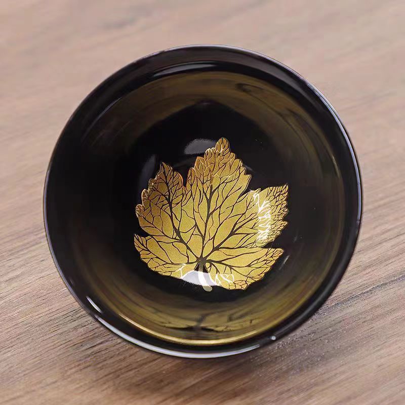 Cốc sứ chính với men vàng đen, cốc trà kung fu lá vàng, cỏ bốn lá, ngân hạnh, lá phong, lá bồ đề.