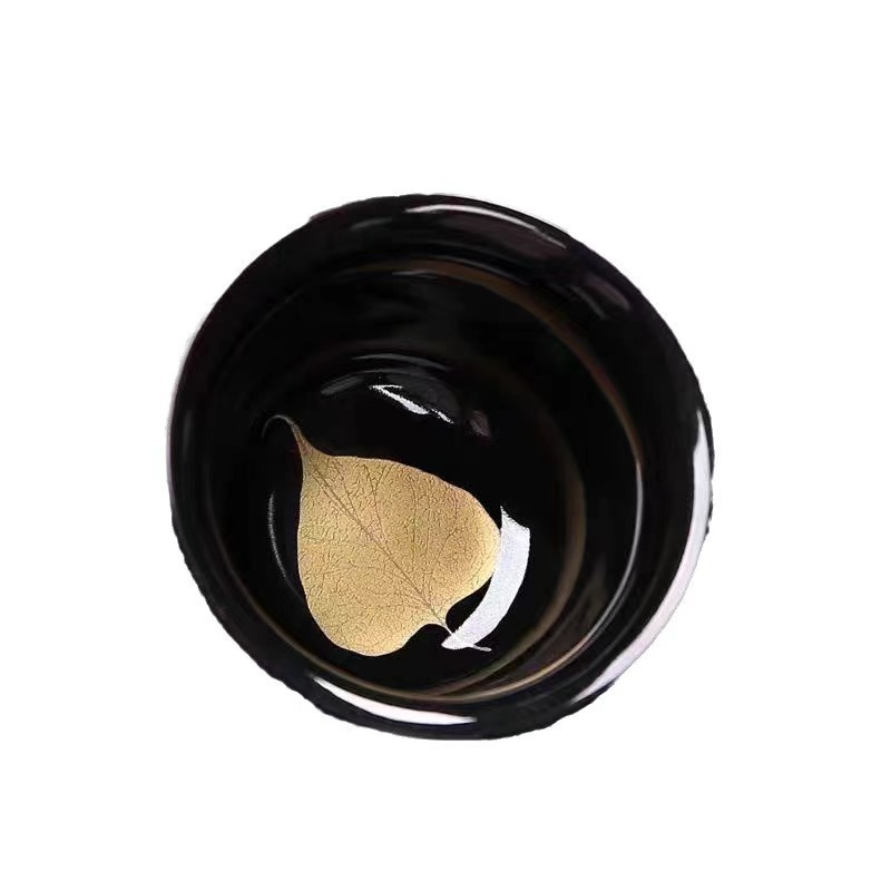 Cốc sứ chính với men vàng đen, cốc trà kung fu lá vàng, cỏ bốn lá, ngân hạnh, lá phong, lá bồ đề.