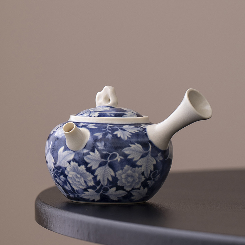 Ấm tay cầm bên đá Thái Hồ tráng men soda ấm trà màu xanh và trắng quốc gia gia dụng ấm trà đơn gốm sứ bộ trà Kung Fu