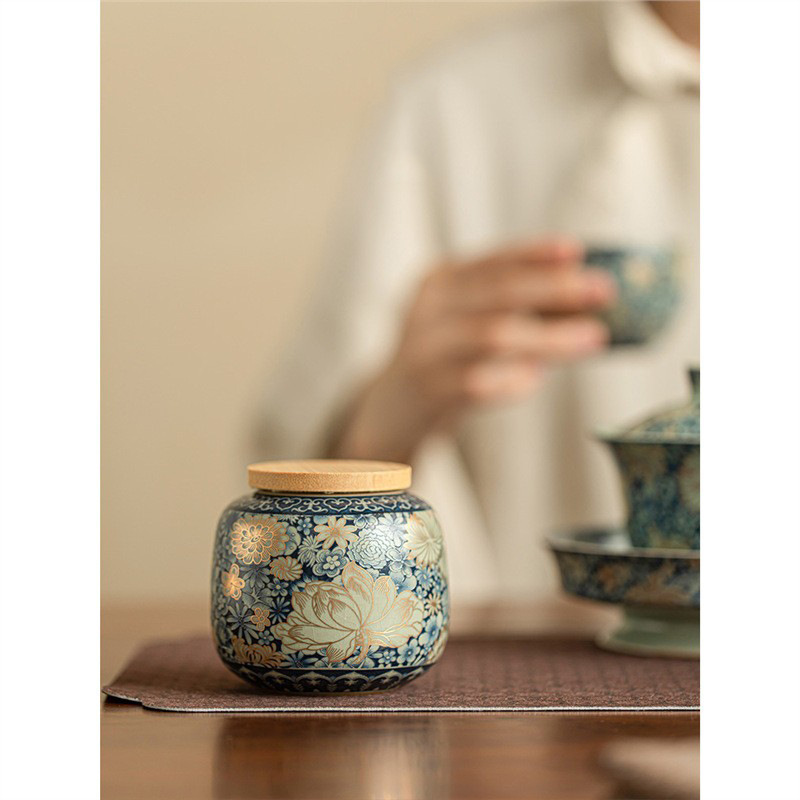 Bình đựng trà hoa Ruyao Bình đựng trà Pu'er nhỏ gia dụng Bình đựng trà gốm sứ cao cấp cầm tay ngoài trời