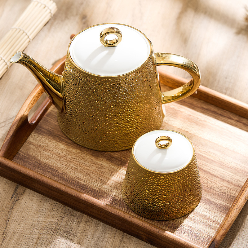 Ấm trà gốm sứ mưa sao băng ấm trà gia dụng có tay cầm ấm trà chiều sáng tạo cao cấp sang trọng ấm trà hoa lọc