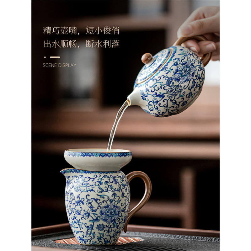 Bộ ấm trà gốm sứ trắng xanh bộ bàn trà nhỏ gia dụng chuyên dụng pha trà mẫu mới 2025 bộ cao cấp nhẹ nhàng
