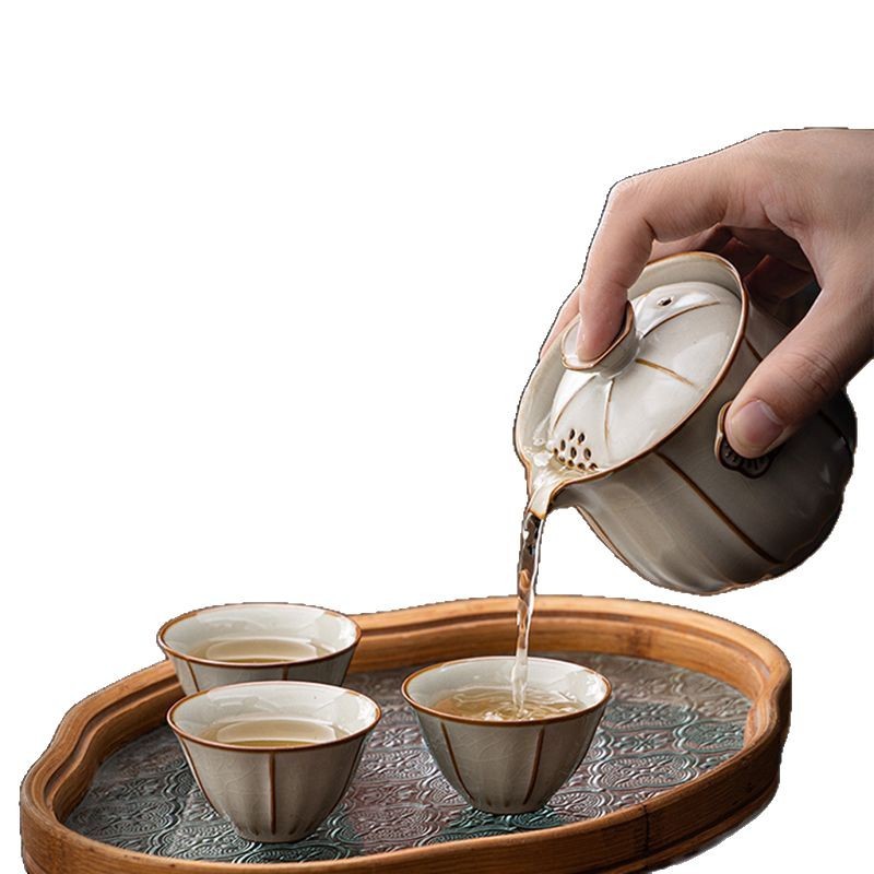 Bộ trà du lịch Daji Mi Huang Ru Kiln Bộ trà nhỏ cầm tay pha trà ngoài trời một ấm ba cốc nhanh Bộ trà Kung Fu