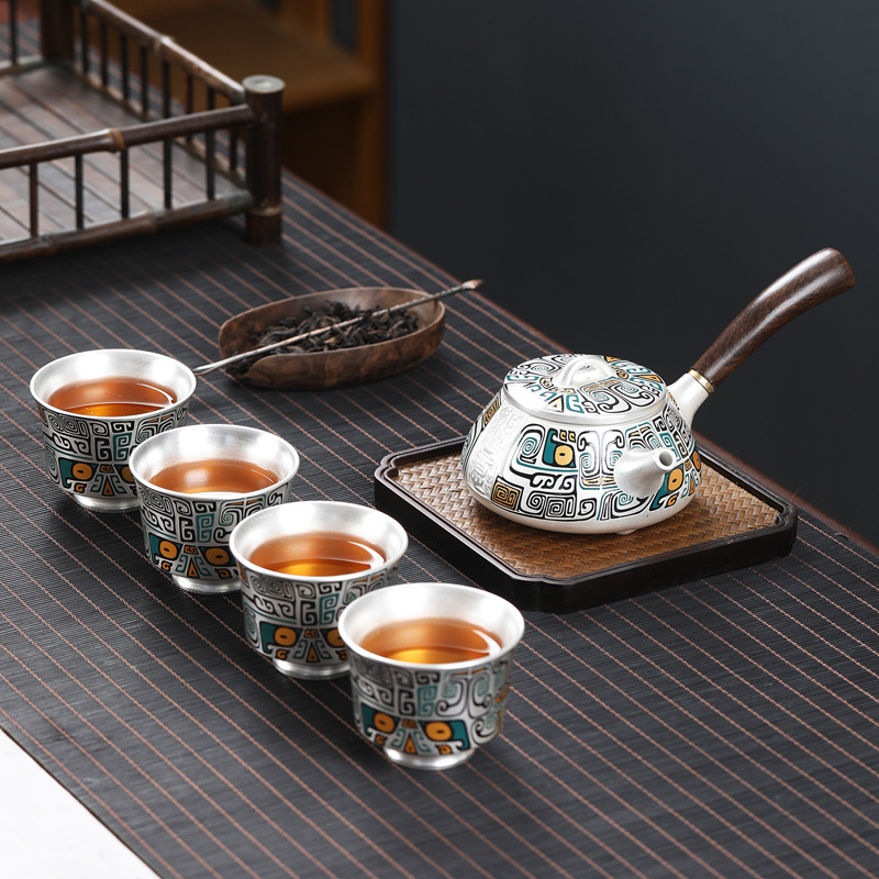 Bộ trà du lịch cầm tay cầm tay văn phòng kiểu Nhật Bản một bình bốn cốc bạc 999 sterling