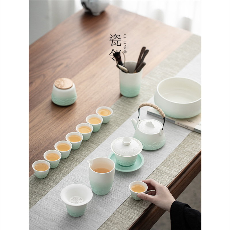 Bộ dụng cụ pha trà Kung Fu Bộ dụng cụ pha trà chạy văn phòng gia dụng bằng gốm sứ tay cầm bên nắp bát cốc trà trọn bộ hộp quà bán buôn