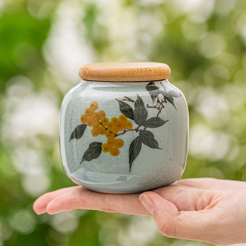 Bình trà borneol Ru Kiln bình gốm sứ mini cầm tay nhỏ bình đựng trà xanh đỏ Pu'er bình rỗng