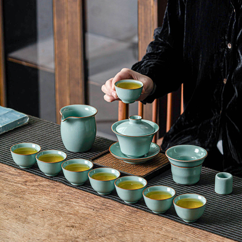 Bộ ấm trà Kung Fu Lò Ru Lò Dâm Hồ Bộ bát có nắp đậy bằng đá nứt vỡ phòng khách gia dụng Ru sứ cốc trà gốm sứ