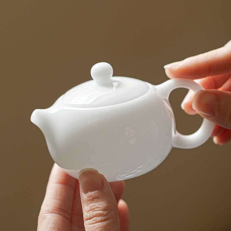 Đá ngọc Sứ mỡ cừu Ngọc Ấm trà nhỏ ấm trà Xi Shi ấm trà đơn sứ trắng Dehua Kung Fu ấm trà gia dụng