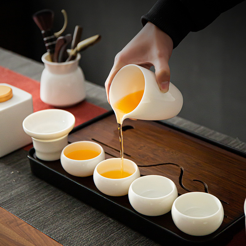 Bộ ấm trà sứ trắng Dehua gia dụng văn phòng mỡ cừu ngọc sứ có nắp đậy ấm Xi Shi tách trà gốm sứ bán buôn