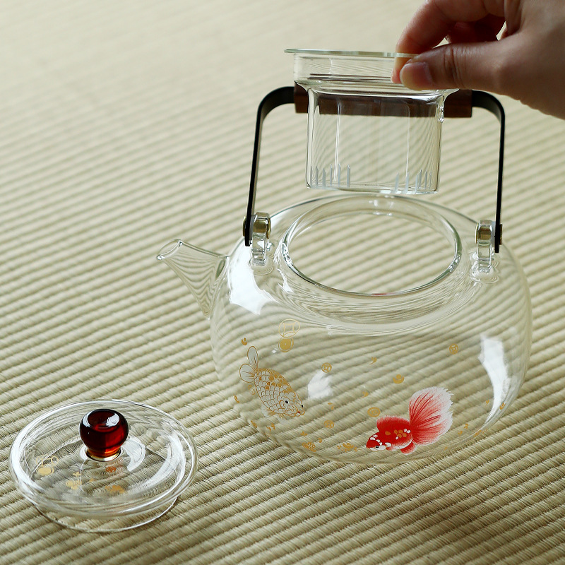 Ấm trà thủy tinh borosilicate cao, dày và chịu nhiệt độ cao, ấm pha trà gia dụng có tay cầm, thích hợp để đun nóng bếp điện gốm, ấm đun nước giữ sức khỏe.