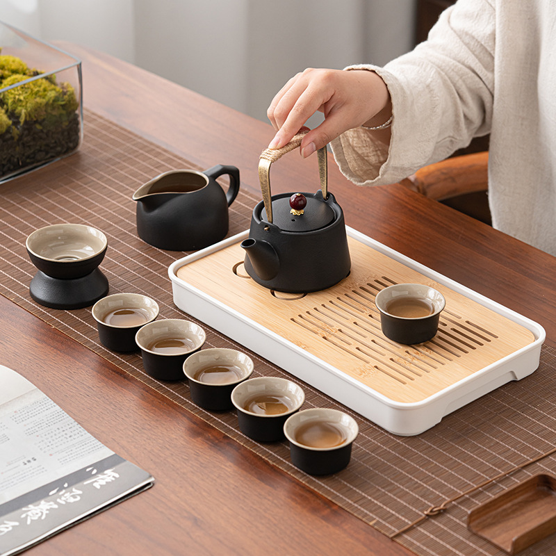 Bộ trà Kung Fu du lịch Nhật Bản bộ nhỏ ấm pha trà cao cấp gia dụng cốc trà gốm sứ khay trà ngoài trời túi xách tay