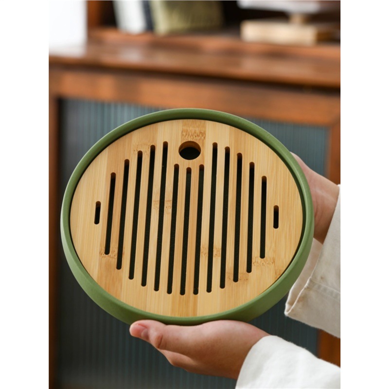 Khay trà gốm sứ pha khô gia dụng cao cấp tinh tế giá trị cao phong cách Trung Quốc mới cổ điển hình tròn sáng tạo khay trà trữ nước bán buôn