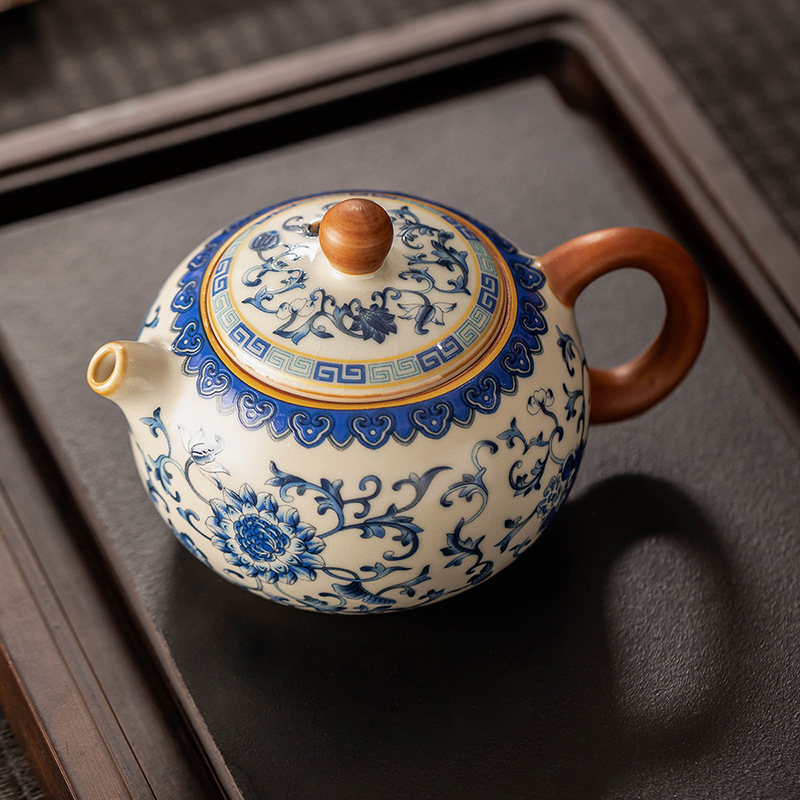 Ấm trà sứ trắng xanh Ruyao ấm trà Xishi ấm trà đơn dụng cụ pha trà gốm sứ cao cấp gia dụng ấm pha trà chống bỏng bán buôn