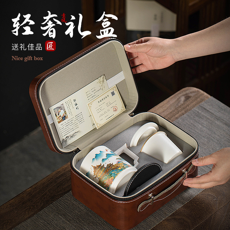 Bộ trà du lịch Bộ đồ sứ ngọc bích loại băng cốc trà cầm tay ngoài trời cốc pha trà gốm sứ nhanh một ấm hai cốc quà tặng