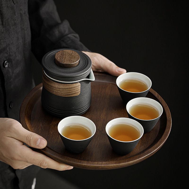 Bộ dụng cụ trà Kung Fu du lịch cầm tay bằng thủy tinh một bình gốm ngoài trời bốn cốc