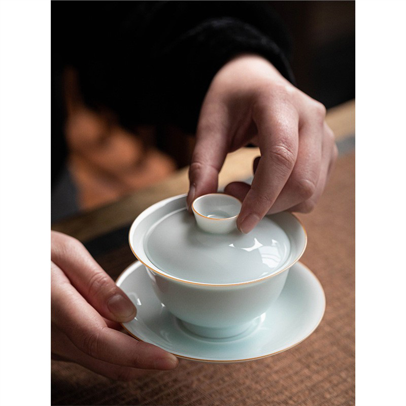 Lốp mỏng lớn có nắp ba cái bát đơn cao cấp Dehua không nóng tay bán buôn bộ trà gốm sứ Kung Fu