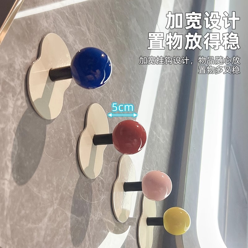 Móc dính cường lực không đục lỗ phòng tắm gia dụng nhà vệ sinh sáng tạo treo tường khăn treo tường đựng đồ móc dính chịu lực