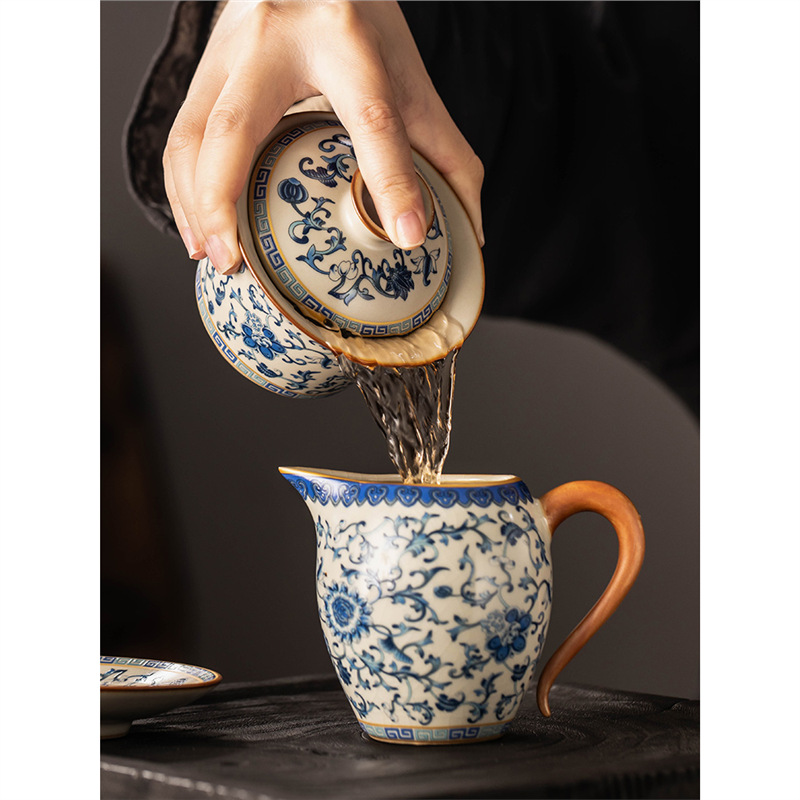 Cốc trà cốc trà cốc trà bộ trà Kung Fu cao cấp đơn có nắp không nóng máy pha trà gốm sứ