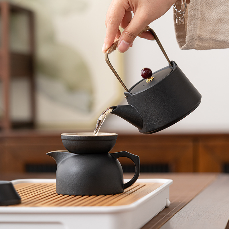 Bộ trà du lịch xách tay kiểu Nhật bộ nhỏ tách trà gốm sứ ngoài trời ấm trà đơn giản gia dụng bán buôn quà tặng