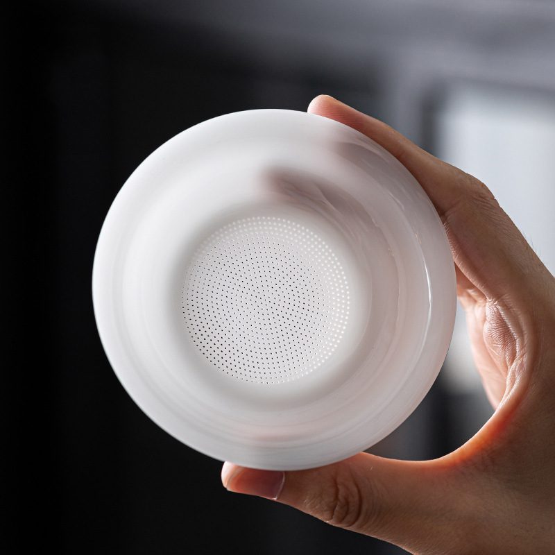 Băng loại sứ trắng mỡ cừu ngọc lọc trà tích hợp lọc trà lọc trà lưới pha trà bộ trà Kung Fu bán buôn trà gốm sứ