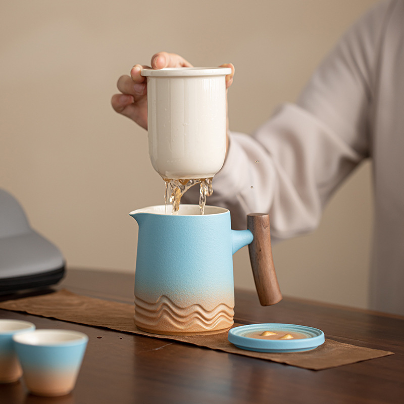 Bộ trà du lịch một bình bốn cốc di động Bộ trà pha trà Kung Fu đơn giản tiện mang theo cắm trại ngoài trời