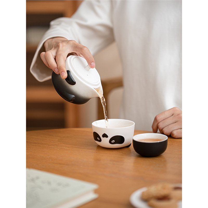 Bộ trà Kung Fu gốm sứ một bình hai cốc cầm tay ngoài trời Panda Kuai Ke thiết bị uống trà túi du lịch