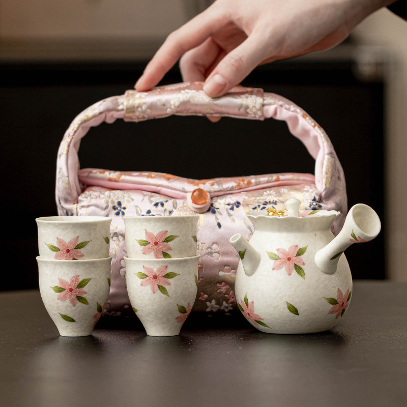 Bộ ấm trà tay cầm bên hoa anh đào mỏ đá Bộ ấm trà cầm tay ngoài trời Bộ ấm trà du lịch giá trị cao