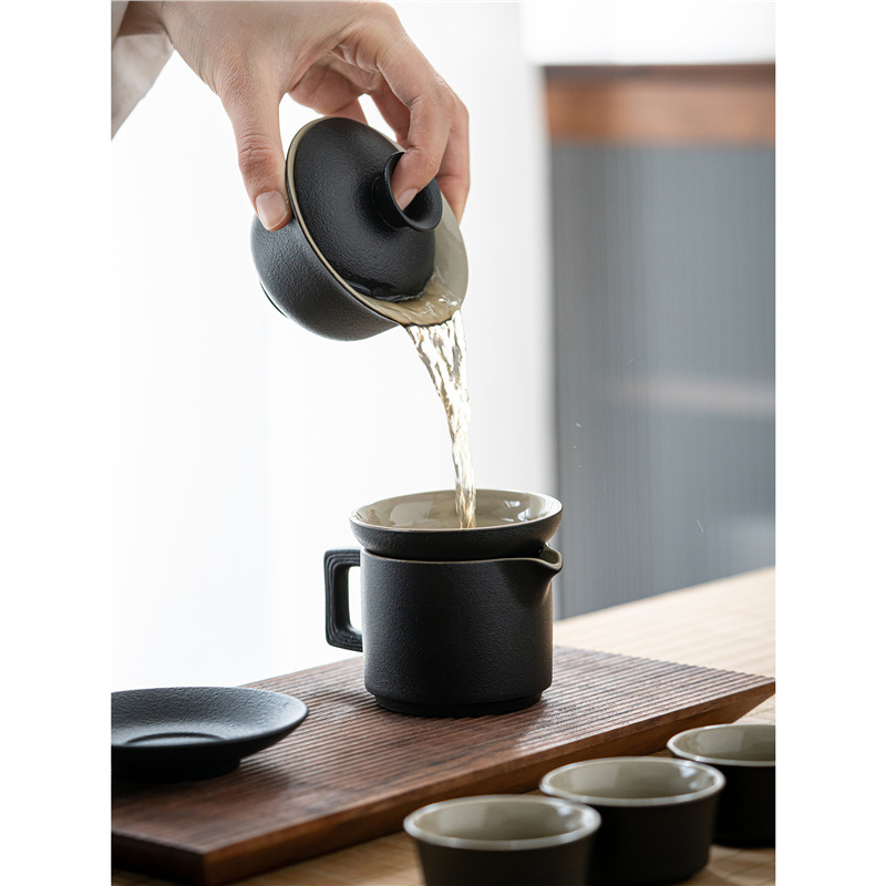 Bộ ấm pha trà gốm đen văn phòng đơn giản phòng khách kiểu Trung Quốc bộ trà bộ nhỏ bộ trà Kung Fu