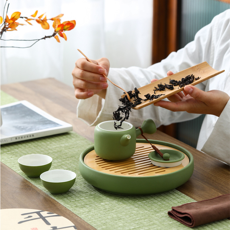 Ấm trà đơn giản hiện đại ấm trà bộ ấm trà ấm trà giữ gìn sức khỏe Trung Quốc gốm cổ điển cao cấp sang trọng văn phòng gia dụng