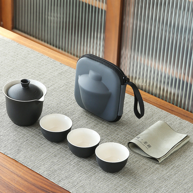 Bộ trà sóng biển gốm thô Bộ một ấm Ba cốc đựng đồ xách tay ngoài trời dụng cụ pha trà đơn giản Bộ trà Kung Fu gốm sứ