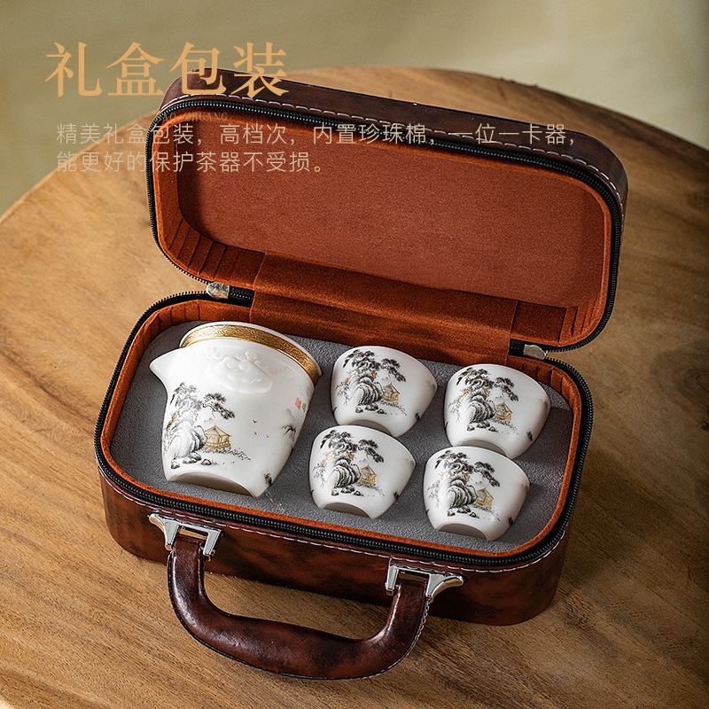 Bộ ấm trà Kung Fu du lịch một ấm bốn cốc cầm tay bộ ấm trà sứ ngọc bích quà tặng cao cấp