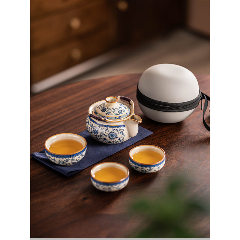 Chậu cầm tay du lịch bộ trà Kung Fu bộ nhỏ di động cắm trại ngoài trời gốm sứ cốc khách nhanh một bình ba cốc bán buôn