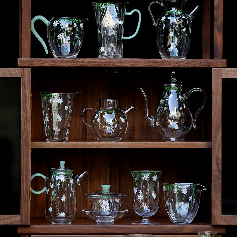 Lễ hội hoa thủy tinh chịu nhiệt borosilicate cao ba mảnh có nắp bát trà xanh bát trà nhỏ tươi bộ trà kung fu bát trà có khay đế