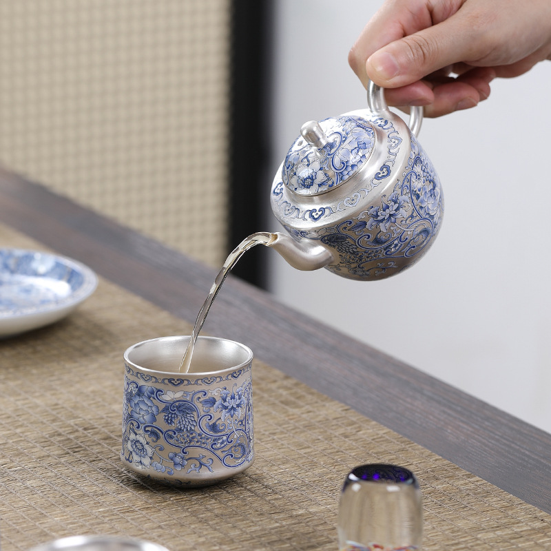 Ấm trà Kung Fu gốm sứ gia dụng màu bạc mạ bạc màu xanh và trắng làm thủ công ấm trà cầm tay hoa sen