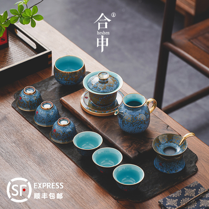 Bộ ấm trà cao cấp phong cách cổ điển nhẹ nhàng sang trọng gia dụng Jun sứ Kung Fu trà nắp cốc công bằng trọn bộ quà tặng Zhang Jinxi