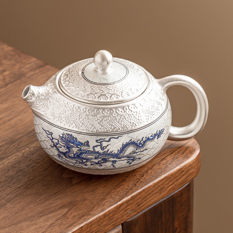 Ấm trà nhỏ tinh xảo mạ bạc 999 ấm trà Feilong Chengyun XiShi ấm trà gốm sứ gia dụng quà tặng nhẹ nhàng