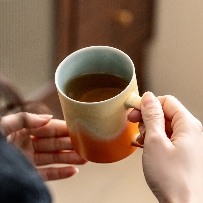 Cốc tách trà nước Jianshan cốc pha trà gốm sứ giá trị cao cốc lọc có nắp hộp quà logo