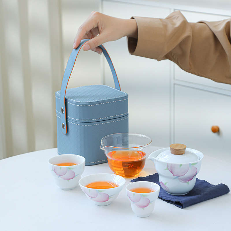 Bộ trà du lịch ngoài trời di động Bình vàng kem Nhật Bản một cốc ba cốc đơn giản ấm trà ngoài trời quà tặng