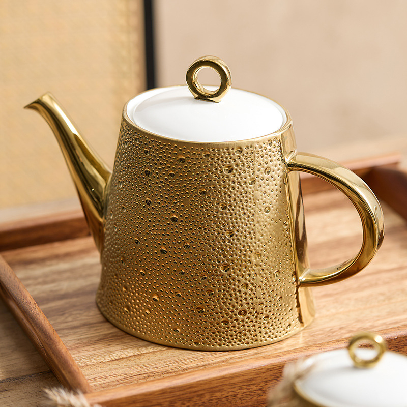 Ấm trà gốm sứ mưa sao băng ấm trà gia dụng có tay cầm ấm trà chiều sáng tạo cao cấp sang trọng ấm trà hoa lọc