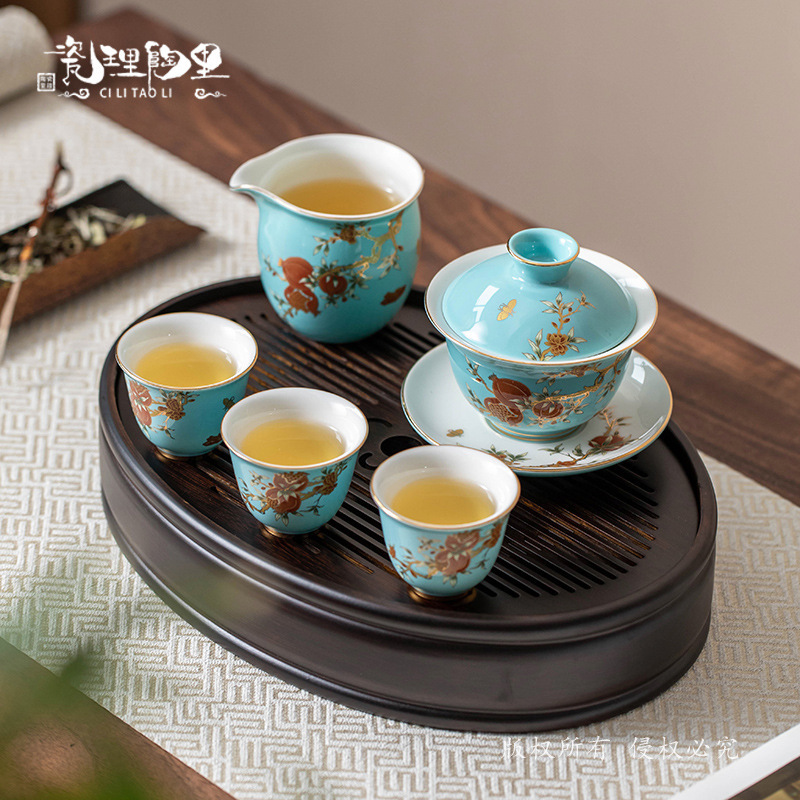 Bộ ấm chén du lịch sứ nhỏ cao cấp phong cách nhẹ nhàng sang trọng màu vàng lựu nhỏ xinh