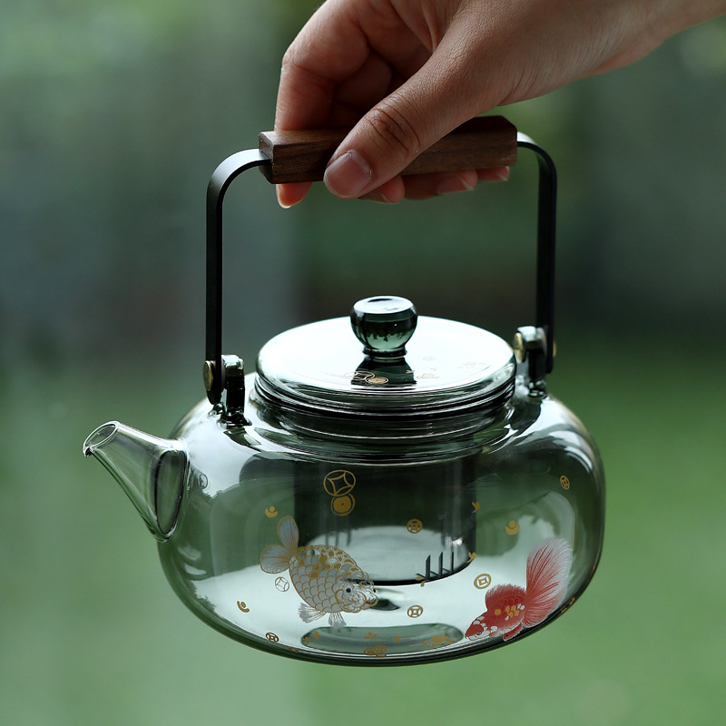 Ấm trà thủy tinh borosilicate cao, dày và chịu nhiệt độ cao, ấm pha trà gia dụng có tay cầm, thích hợp để đun nóng bếp điện gốm, ấm đun nước giữ sức khỏe.