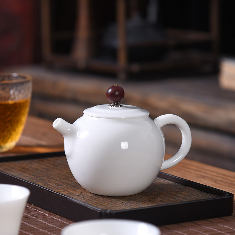 Ấm trà gốm sứ trắng ngọc bích Dehua ấm trà gia dụng có lưới lọc ấm làm đẹp bộ ấm trà Kung Fu đơn bán buôn