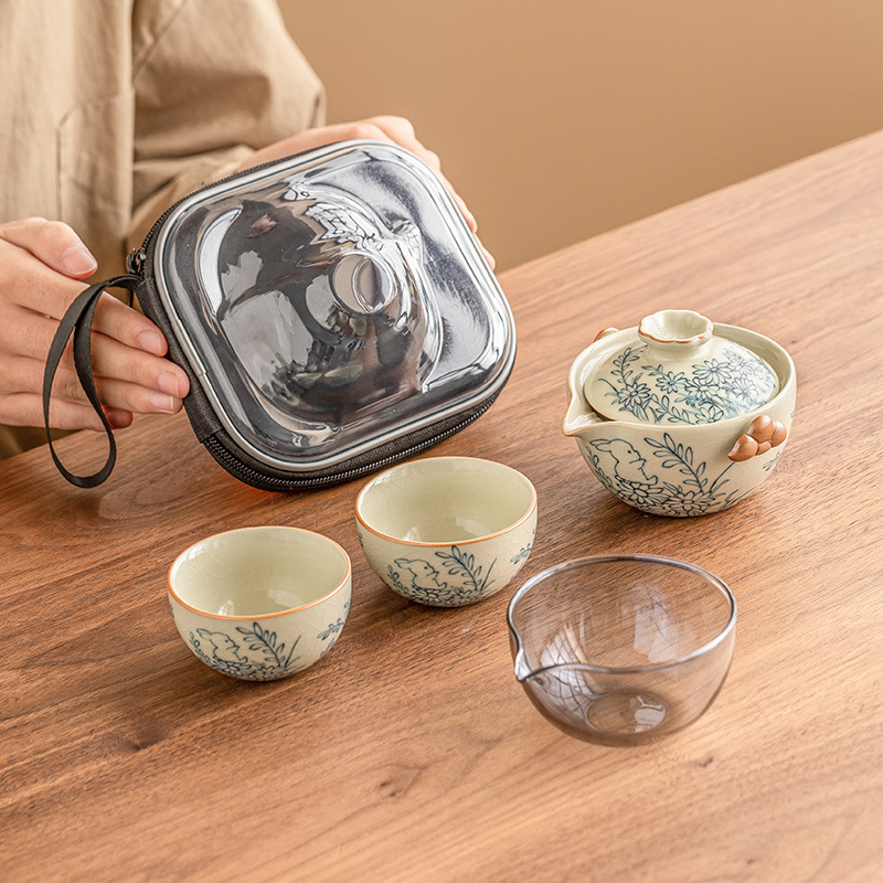 Hoa hướng dương Mengtu Ru lò một bình hai cốc bộ ấm trà du lịch ngoài trời di động ấm trà gốm sứ kiểu Trung Quốc