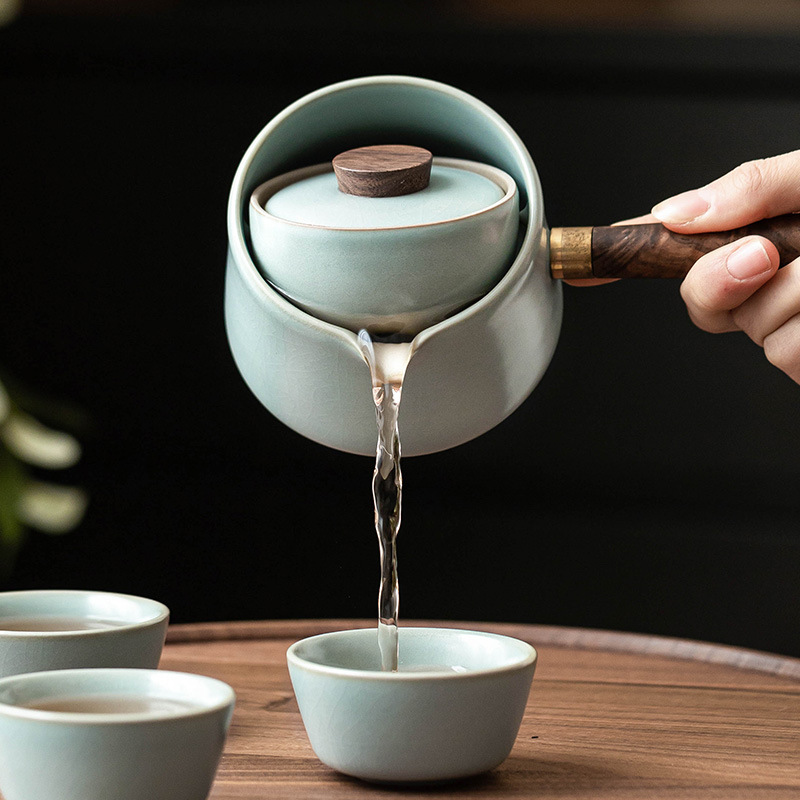 Bộ dụng cụ pha trà ấm tay cầm bên lò Thiên Thanh Ru sáng tạo xoay ấm trà pha trà gia dụng ngoài trời không nóng một ấm ba chén